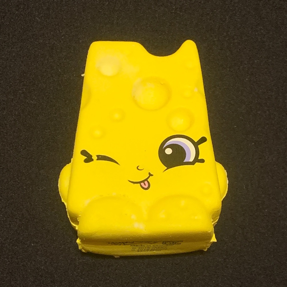 Shopkins Squish Dee Lish Cheese Shaped Squishy Toy